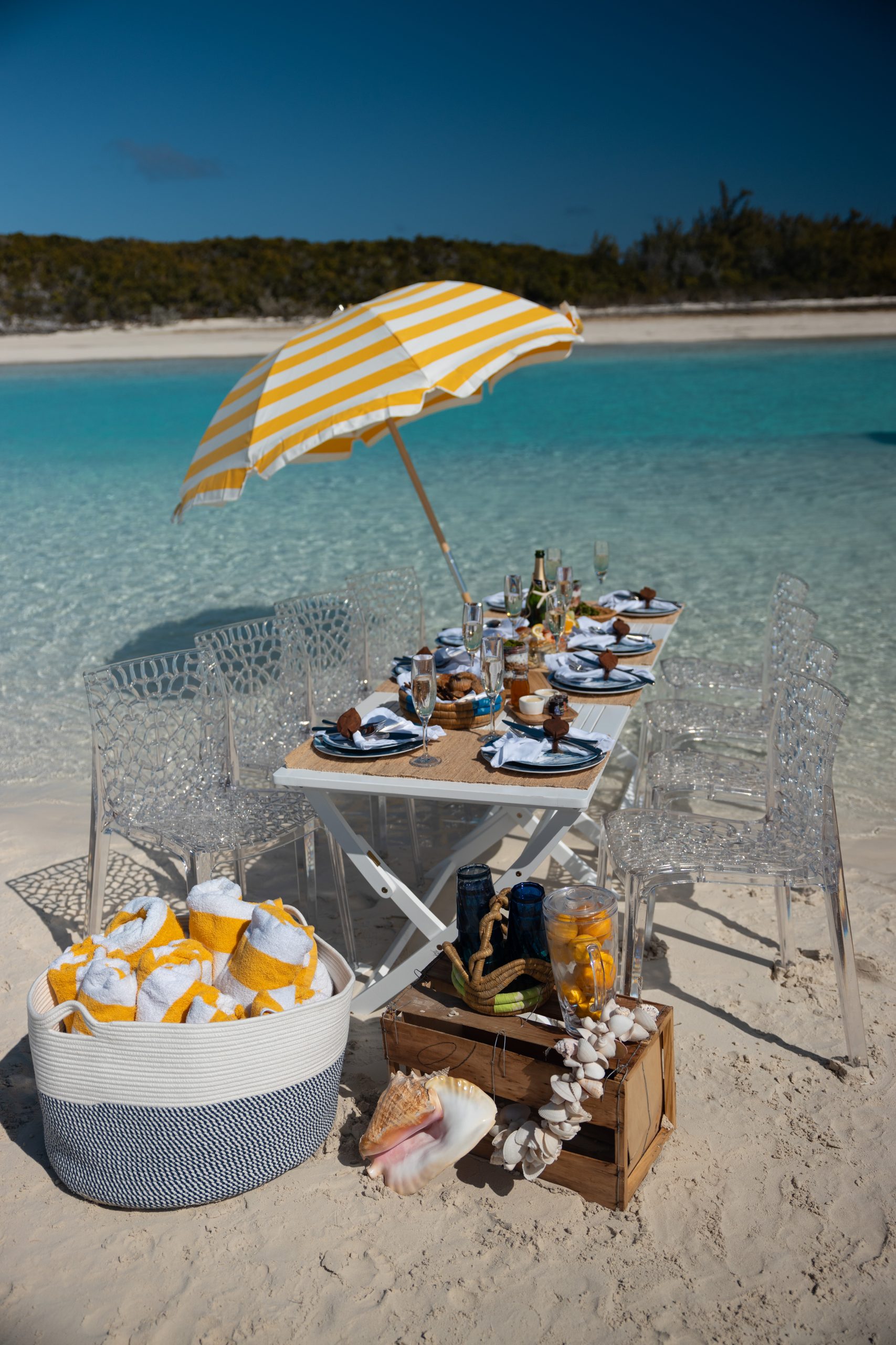 Staniel Cay Adventures offers a vibrant yellow and white umbrella perfect for Staniel Cay Tours or Staniel Cay Fishing excursions.